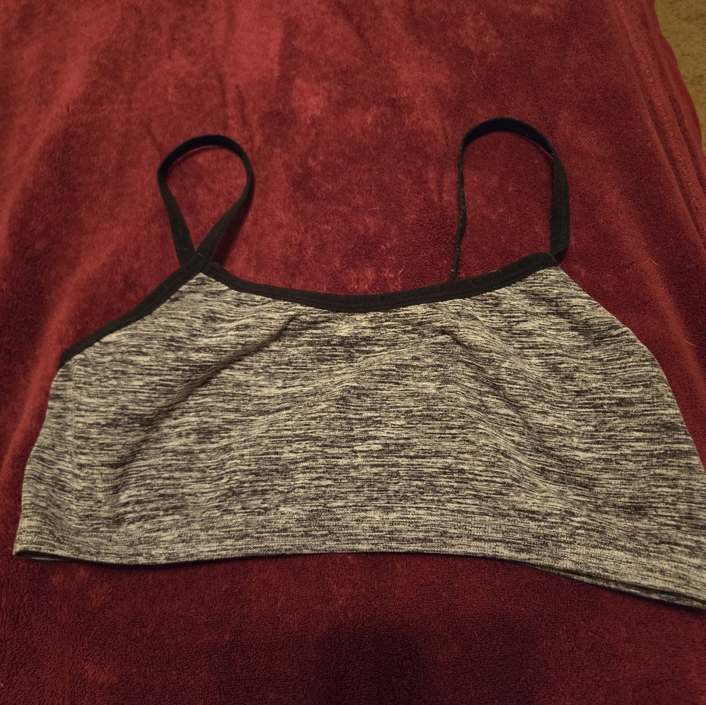 Cute gray and black sports bra. No tag. Fits like an extra small/small.